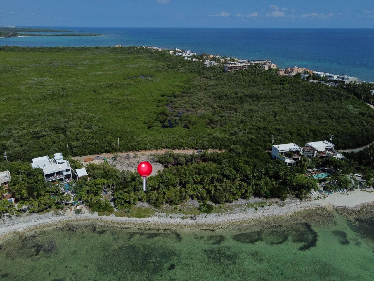 Terreno beachfront en Tankah Bay: 79 m de frente de mar entre Tulum y Akumal, con escritura pública